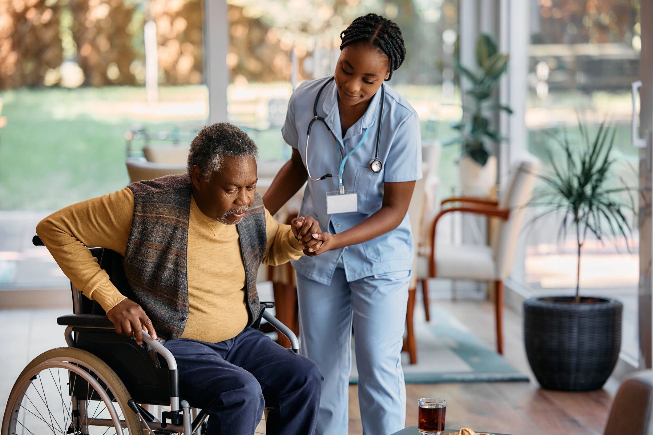 Nurse providing compassionate care at home